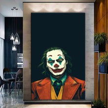 Load image into Gallery viewer, Canvas printed painting of Joker with vibrant colors and dramatic design in a modern living room setting.