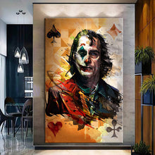 Load image into Gallery viewer, Canvas printed painting of the Joker, featuring bold colors and sharp details in a modern living space.