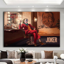 Load image into Gallery viewer, Canvas printed painting of the Joker, featuring bold colors and sharp details in a modern living space.